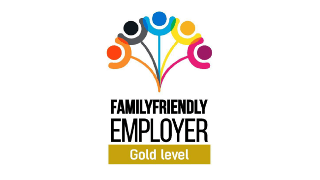 Logo for Family Friendly Employer Gold level certificate, featuring text and five multicolored flower shapes above.