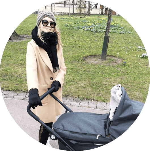 Päivi with baby carriage