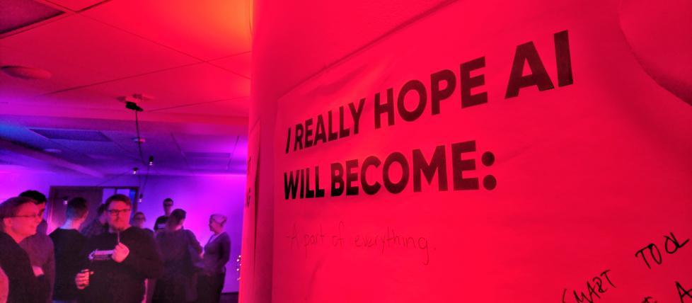 Text on a red wall: I really hope AI will become: